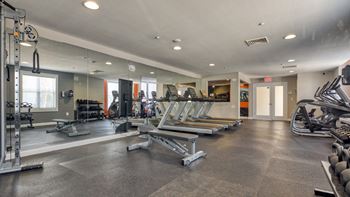 Fitness center with cardio machines and free weights